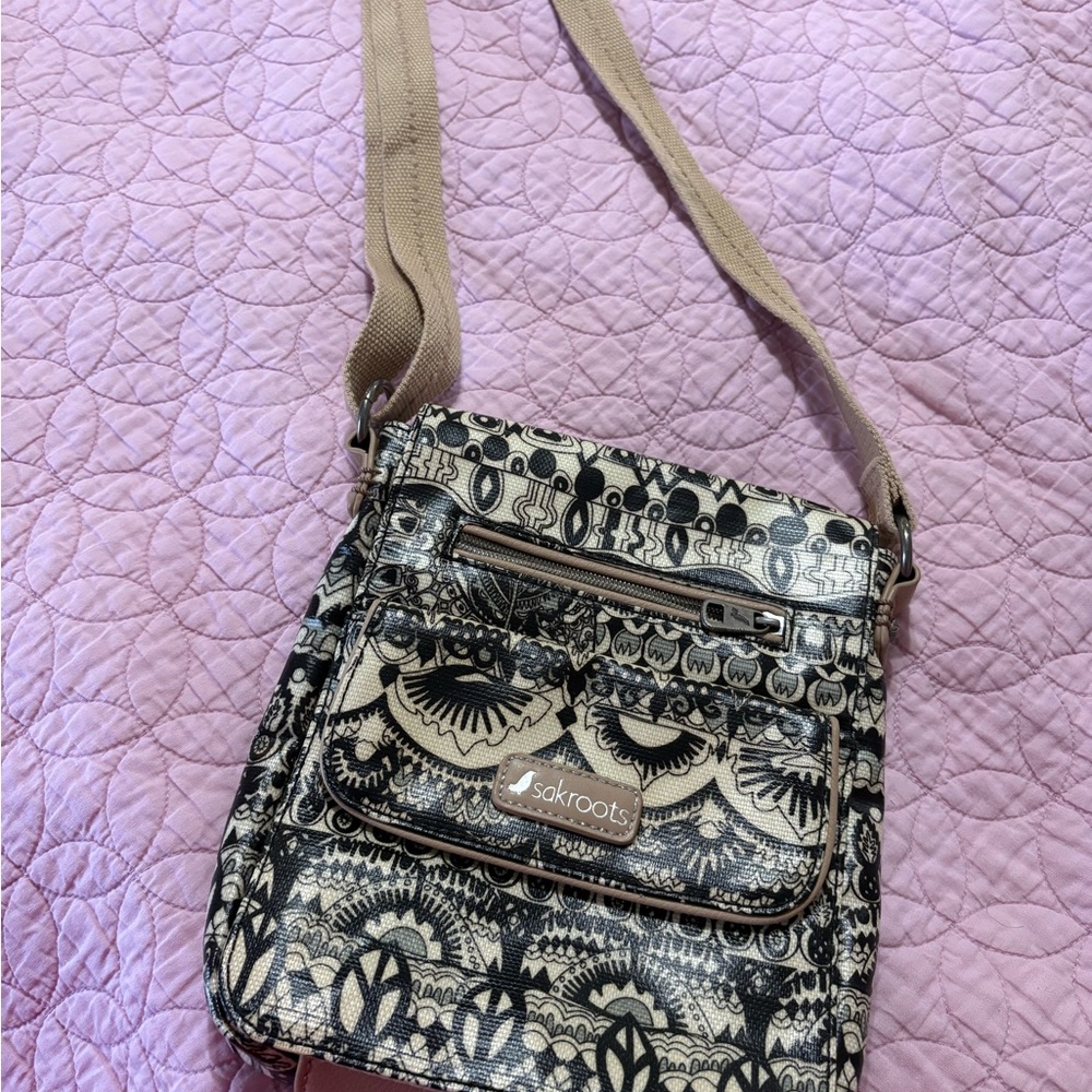Sakroots Black and Cream Crossbody Bag with Vintage-Inspired Design